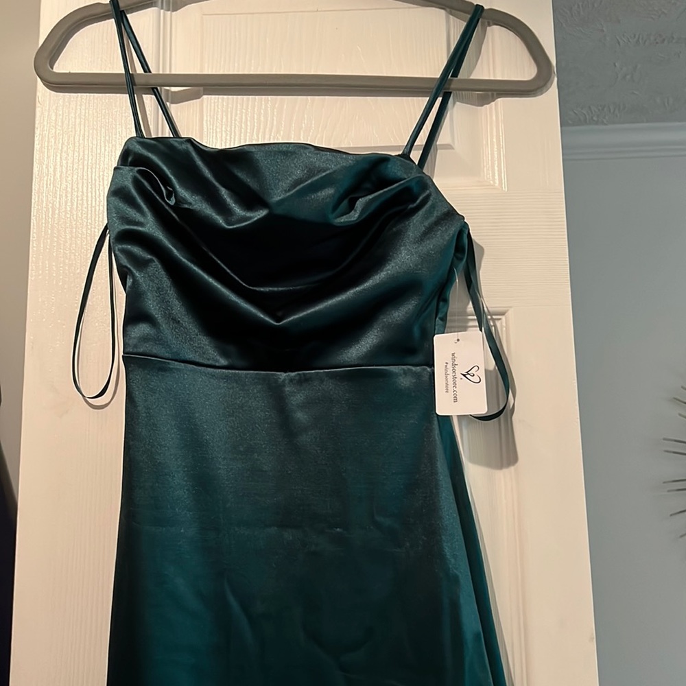 Too small, never worn beside to try on. Size XS from Windsor